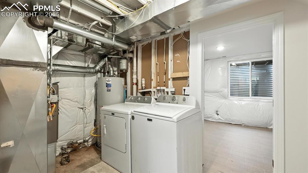 Image 35 of 50: Basement Laundry/Utility Room.