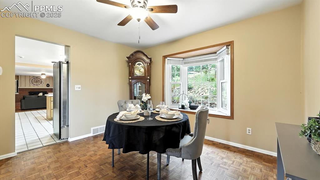 Image 12 of 50: Convenient Kitchen access from the Formal Dining Room.