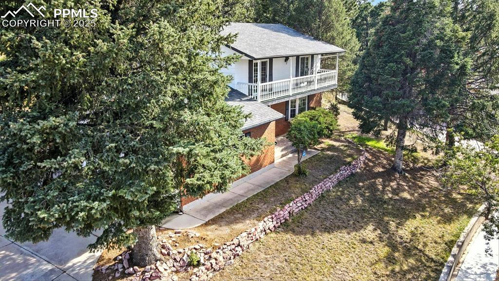 Image 4 of 50: Aerial view of front yard.