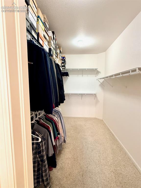 Image 21 of 42: Master closet