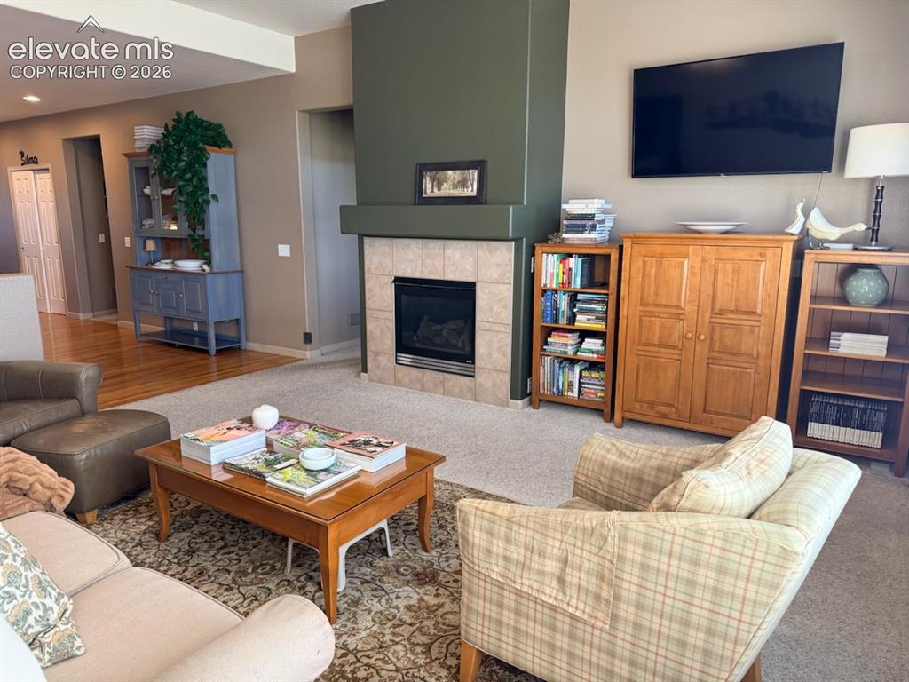 Image 34 of 42: Family room gas fireplace