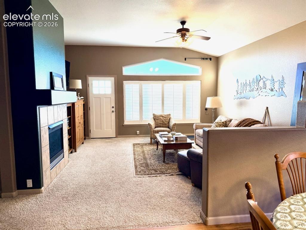 Image 35 of 42: Family room walks out to trex deck