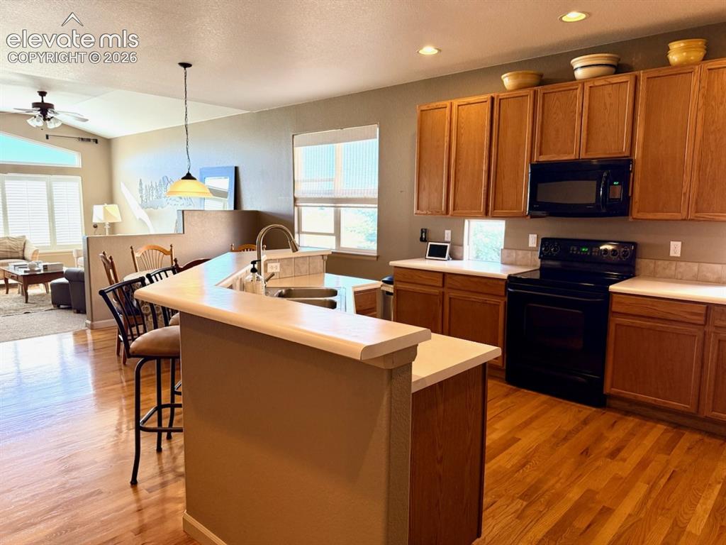 Image 8 of 42: Kitchen original hardwood floor