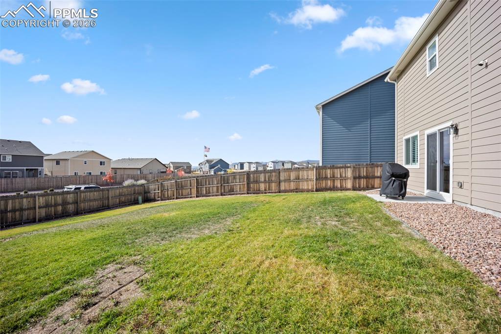 Image 31 of 38: Fabulously large rear yard-fully fenced