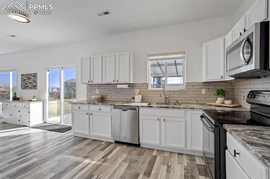 Image 13 of 46: Where coffee gets made, meals get cooked, and DoorDash orders get unpacked.