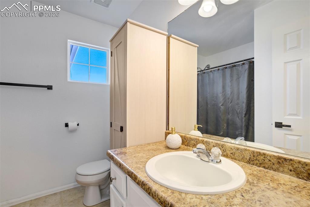 Image 33 of 46: Full secondary bathroom upstairs.