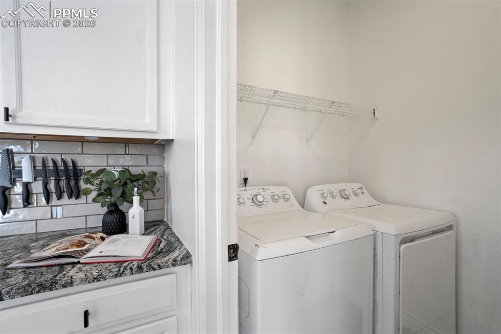 Image 34 of 46: Laundry area on the main level.