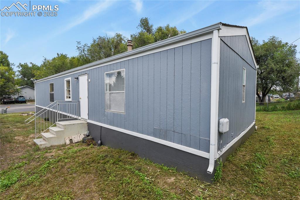 Image 28 of 29: Side entry to dining and laundry areas