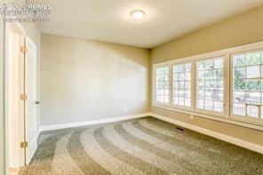 Image 19 of 30: View from dining area to front door, huge open area
