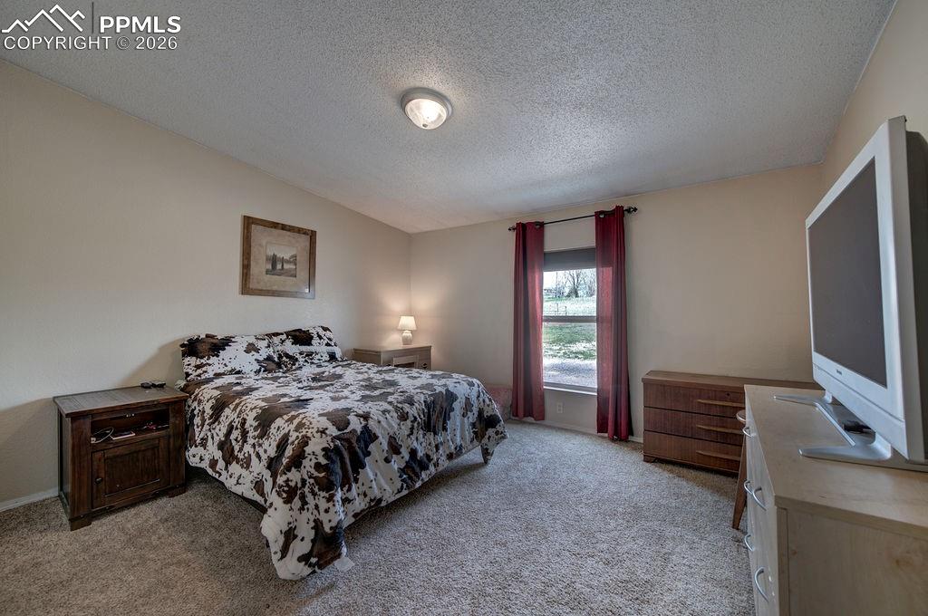 Image 24 of 39: Bedroom