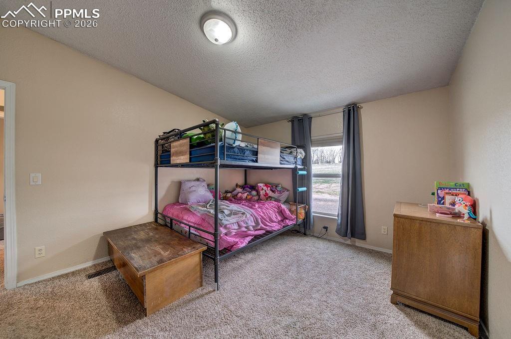 Image 27 of 39: Bedroom