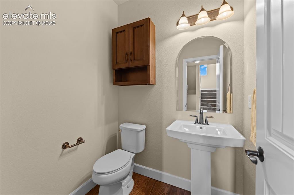 Image 19 of 50: mail level 1/2 bath