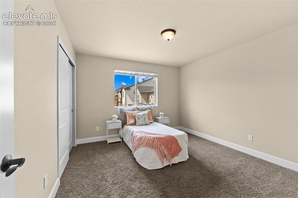 Image 28 of 50: Upstairs bedroom