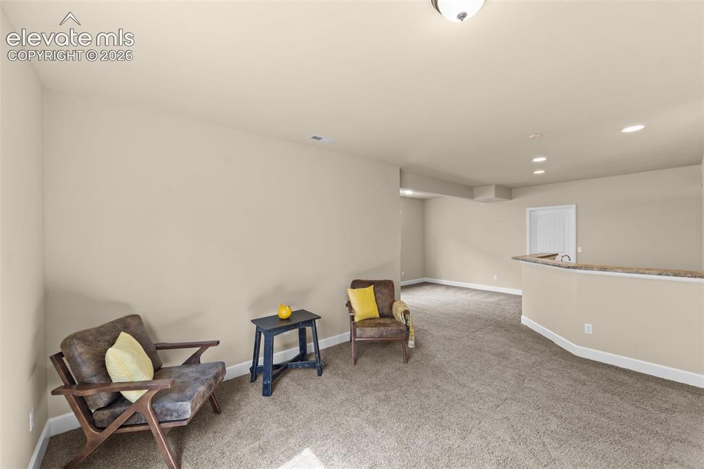 Image 34 of 50: Basement family room