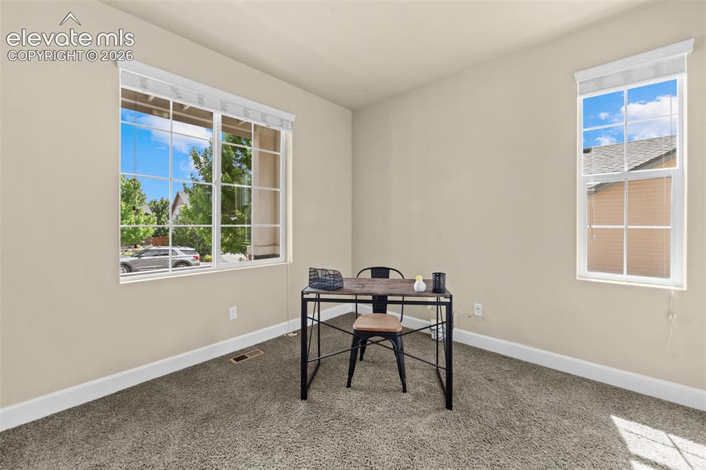 Image 8 of 50: office/flex room/bedroom with closet on the main