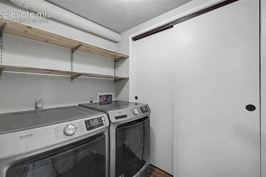 Image 18 of 29: Main level laundry