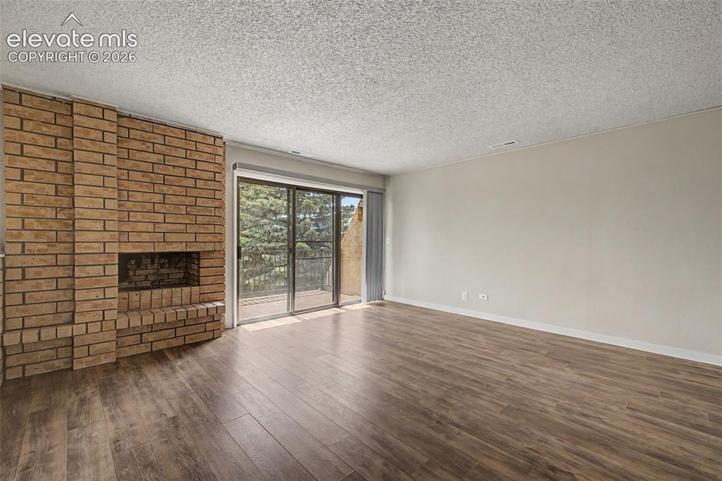 Image 19 of 29: Partial lot primary bedroom with private deck space