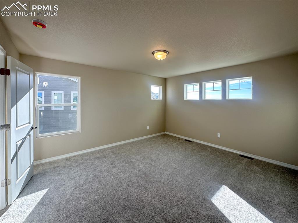 Image 13 of 30: Master Bedroom