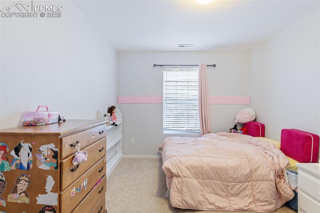 Image 23 of 26: Bedroom