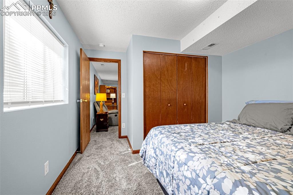 Image 23 of 33: Bedroom