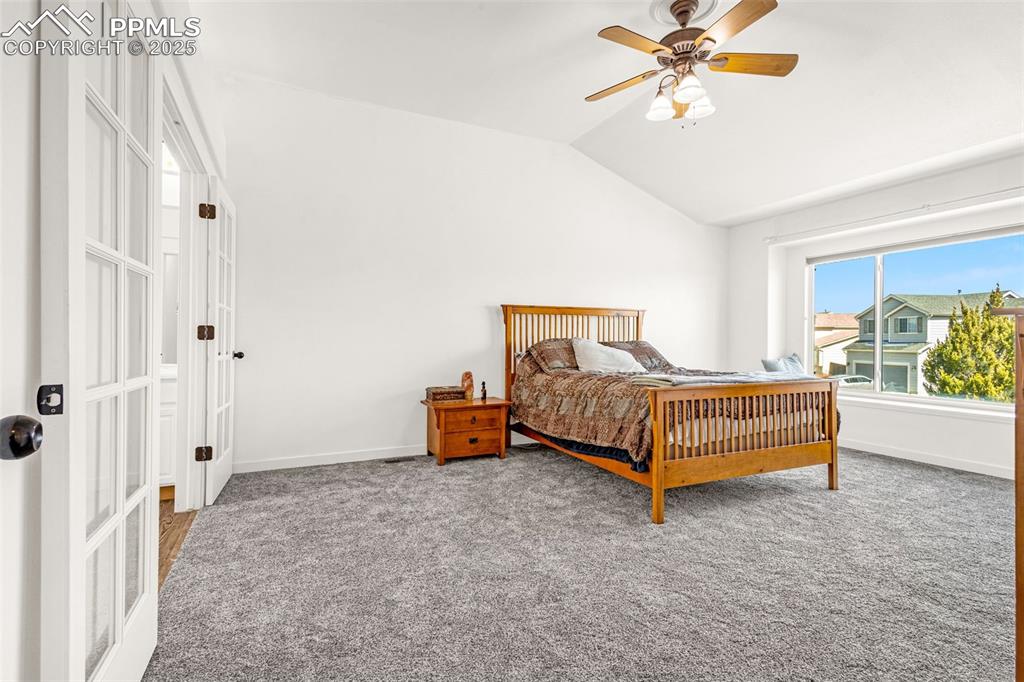 Image 8 of 17: Master Bedroom with triple pained window and new carpet.