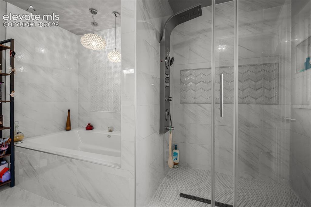 Image 19 of 50: Master Bathroom