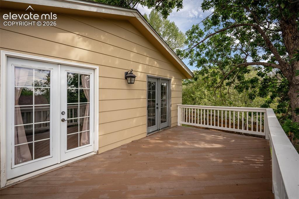 Image 21 of 50: View of Deck from Primary Bedroom
