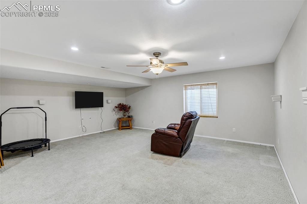 Image 25 of 44: Sitting room featuring carpet floors, recessed lighting, and ceiling fan