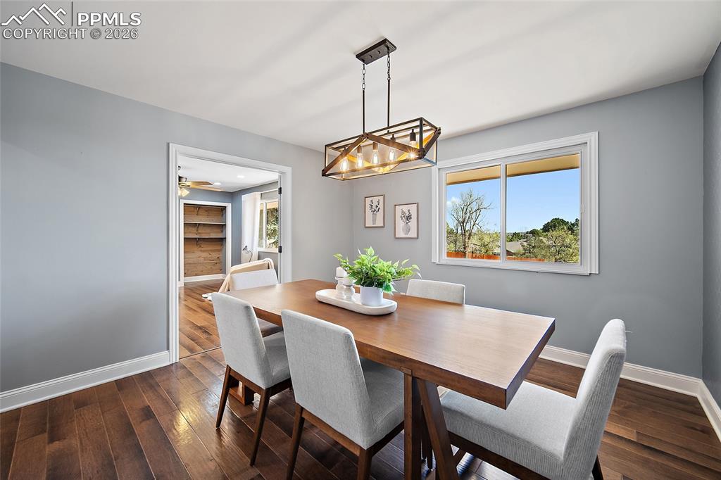 Image 19 of 50: Formal dining room.