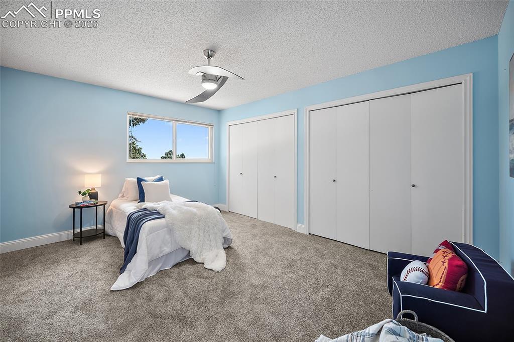 Image 24 of 50: 1st main level bedroom.