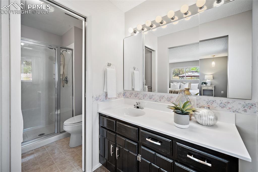 Image 30 of 50: Primary bathroom.