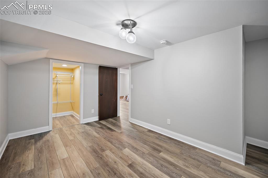 Image 33 of 50: Lower level bedroom.