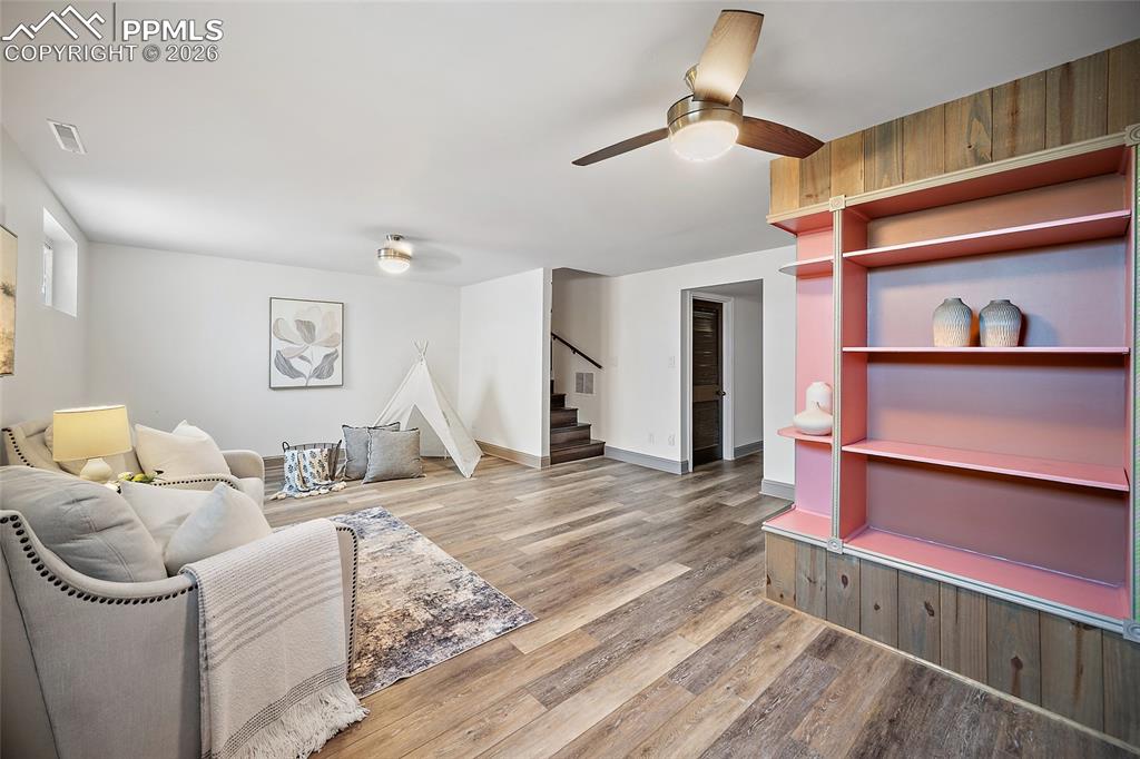 Image 5 of 50: Lower level family room.