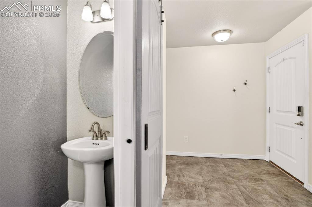 Image 9 of 24: Powder room - main level