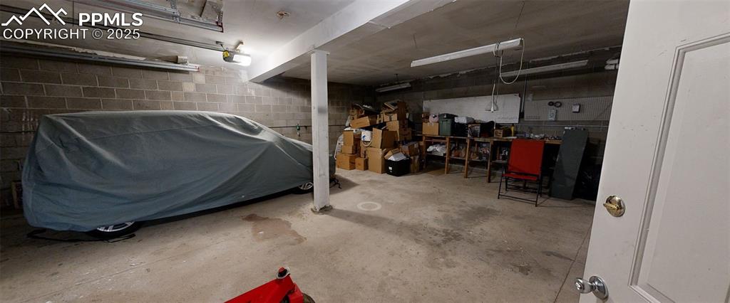 Image 11 of 23: Bathroom featuring vanity, a stall shower, and light marble finish floors