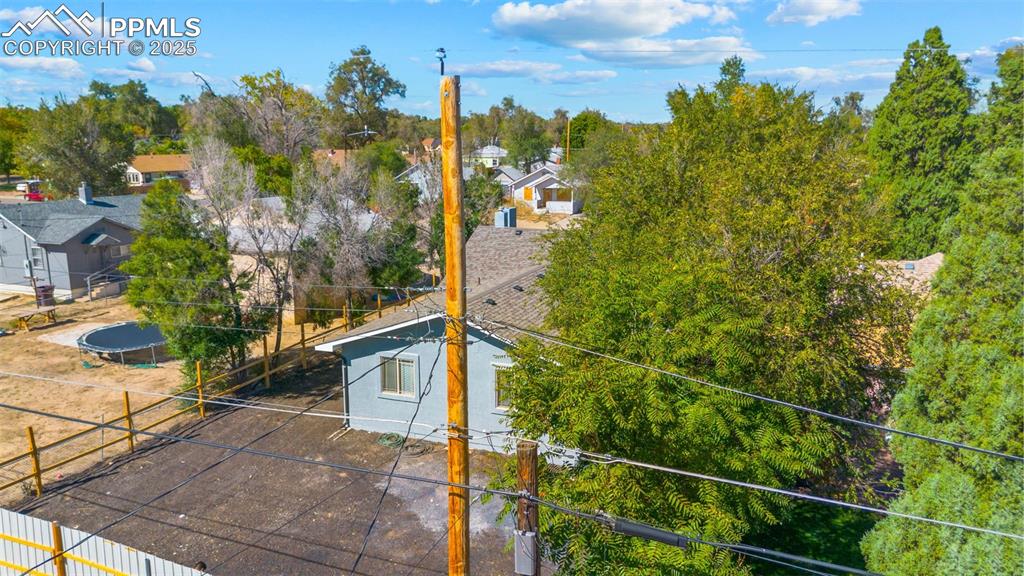 Image 26 of 32: Aerial view of residential area featuring property boundaries highlighted