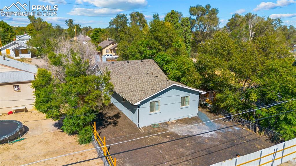 Image 27 of 32: Aerial view of property and surrounding area