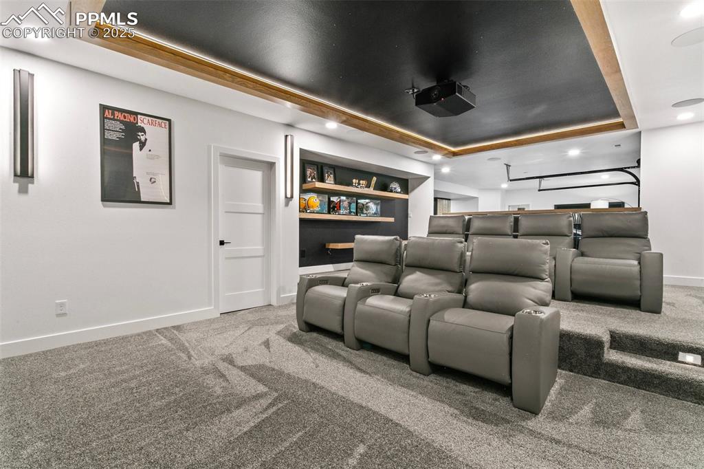 Image 39 of 50: Spacious theatre with seating for 11 plus a few bean bags! Is it movie time