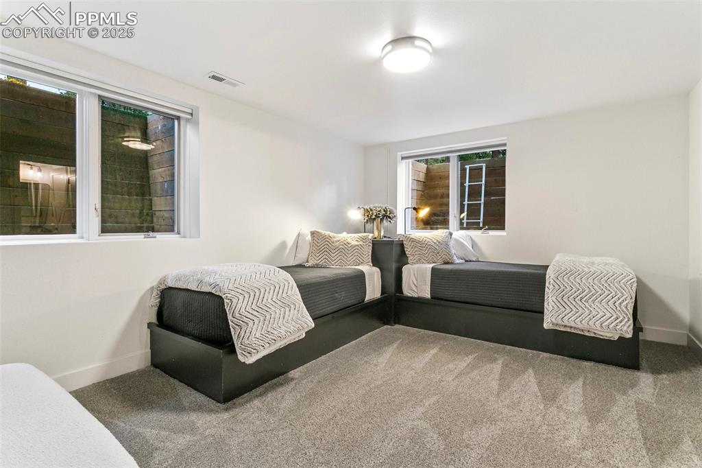 Image 44 of 50: Space enough for 2 in this ensuite bedroom that also has a large Walk in Cl