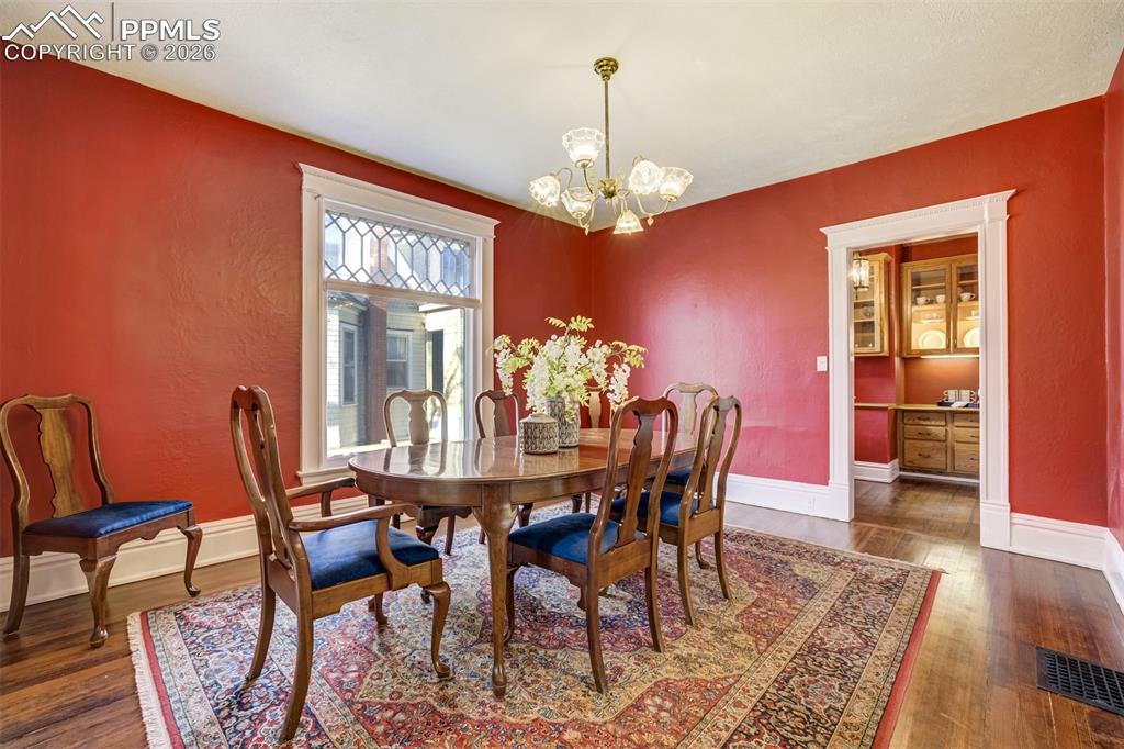 Image 11 of 50: Large dining room offers attached butler