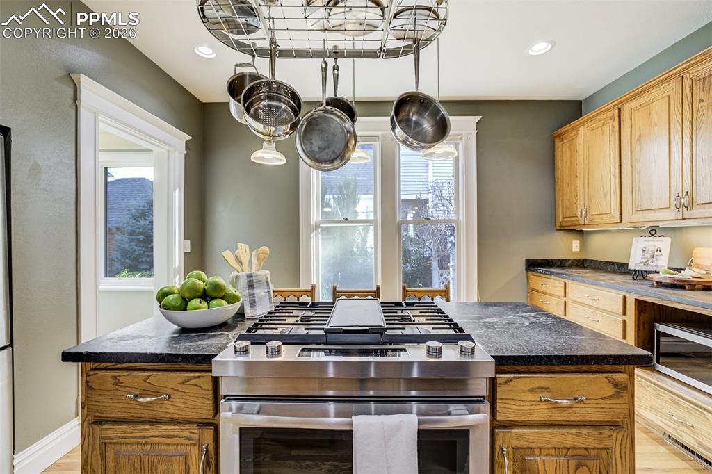 Image 15 of 50: Updated kitchen with stainless steel appliances
