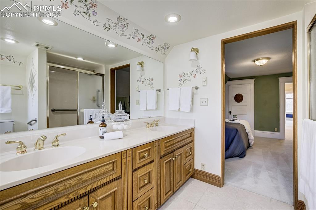 Image 27 of 50: A private primary bathroom with temperature control 