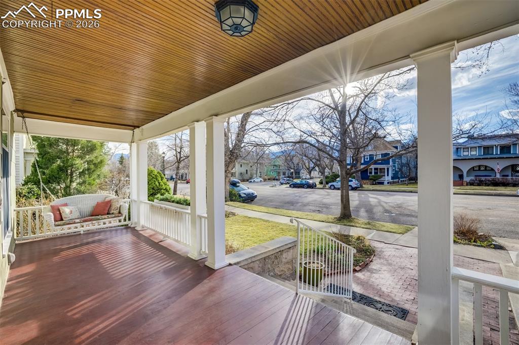 Image 3 of 50: Charming covered front porch