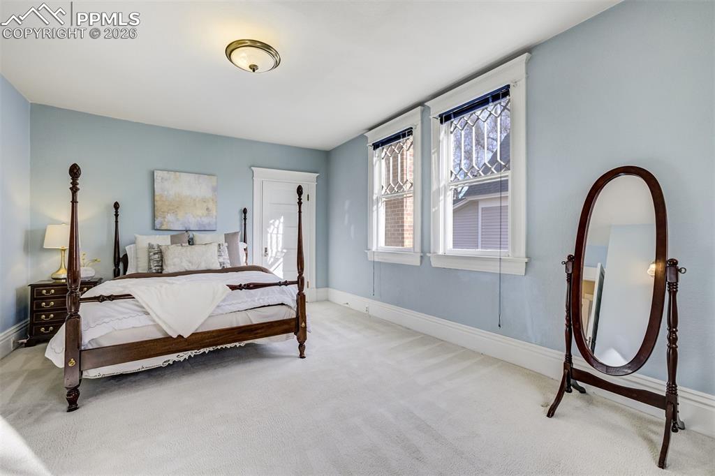 Image 30 of 50: A second spacious bedroom