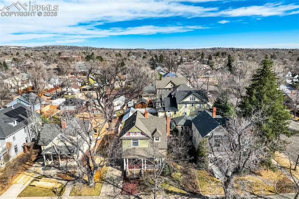 Image 47 of 50: Beautiful neighborhood with mature trees - just imagine what the foliage lo