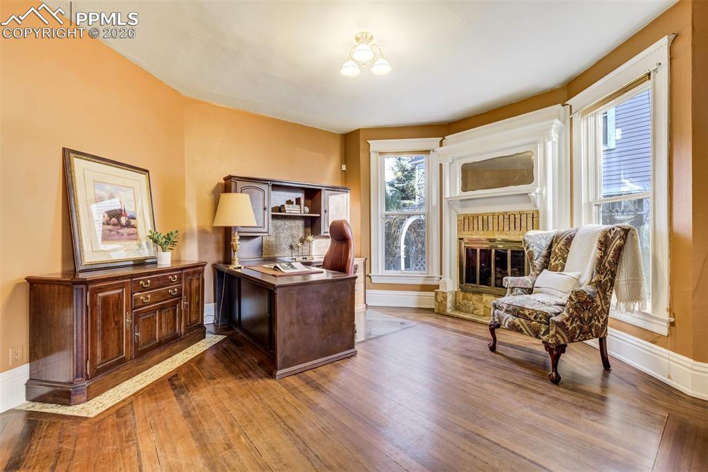 Image 8 of 50: Cozy family room with cozy gas fireplace