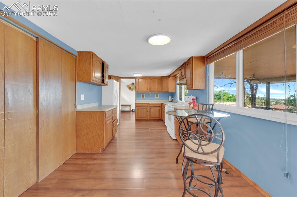 Image 14 of 32: Kitchen with large pantry and breakfast nook