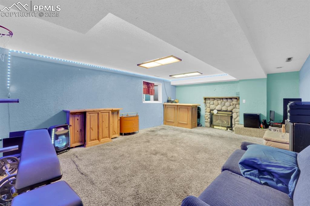 Image 25 of 32: Large rec room in basement 