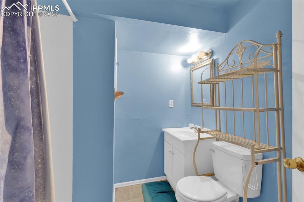 Image 26 of 32: 3/4 hall bathroom in basement 