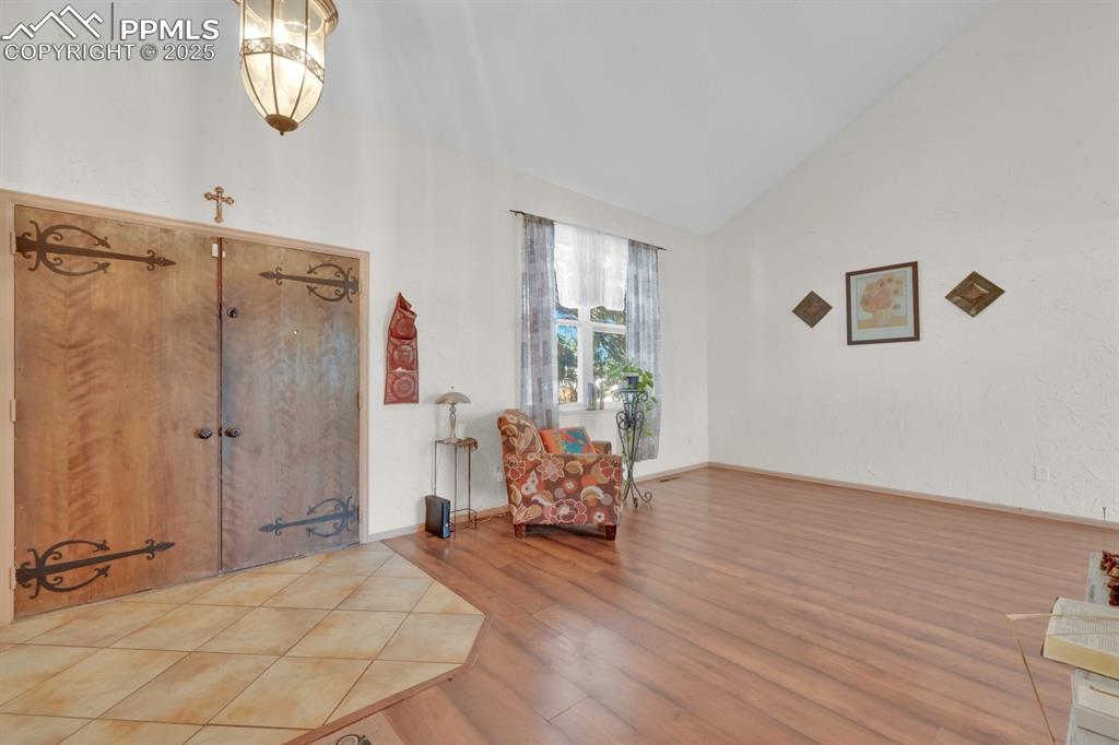 Image 8 of 32: Foyer featuring high ceilings